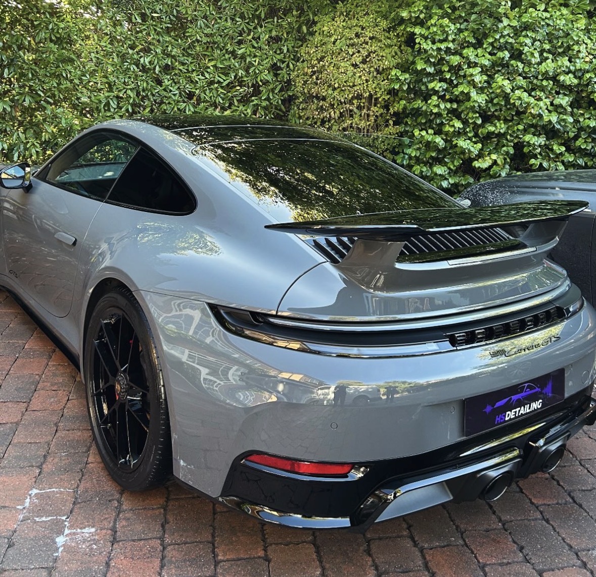 Silver Porsche 911 Carrera GTS rear