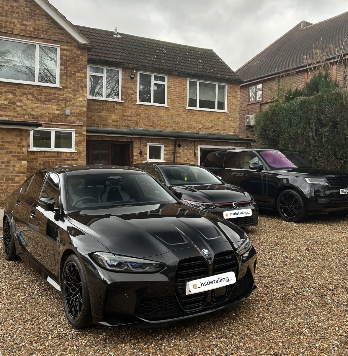 Black BMW M3 Competition on the driveway